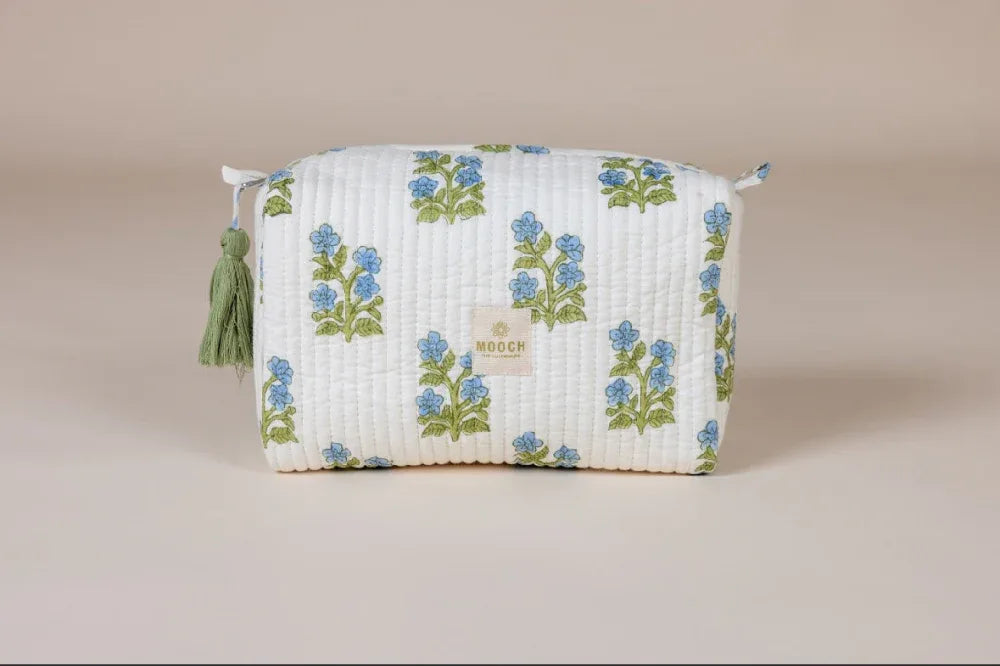 Blue and green floral quilted wash bag in shopify image
