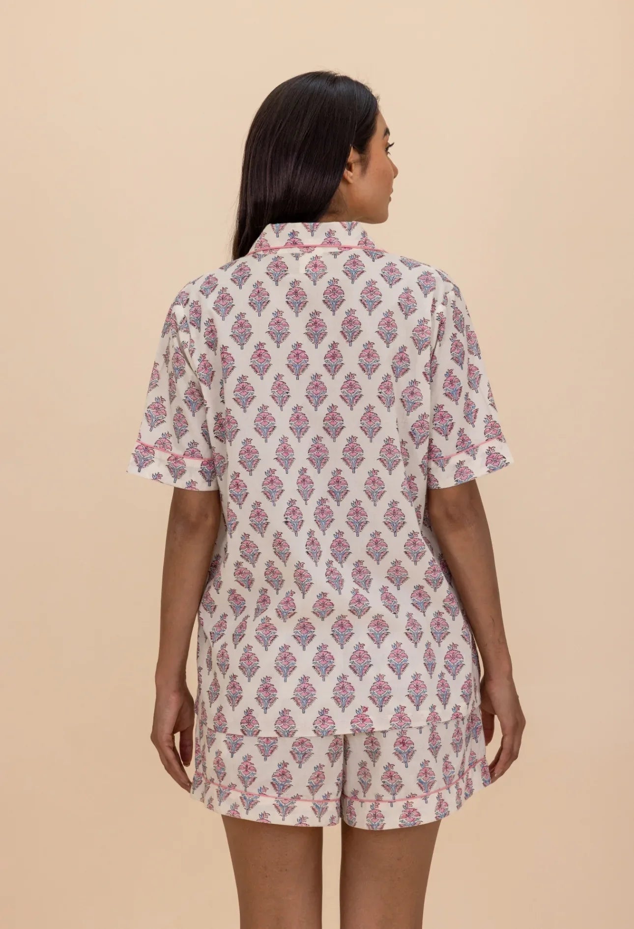 Back of model wearing Booti Blush Bloom pyjamas