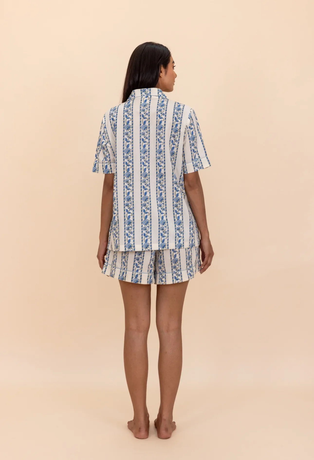 Back of model wearing Cobalt Ribbon Cotton Pyjamas
