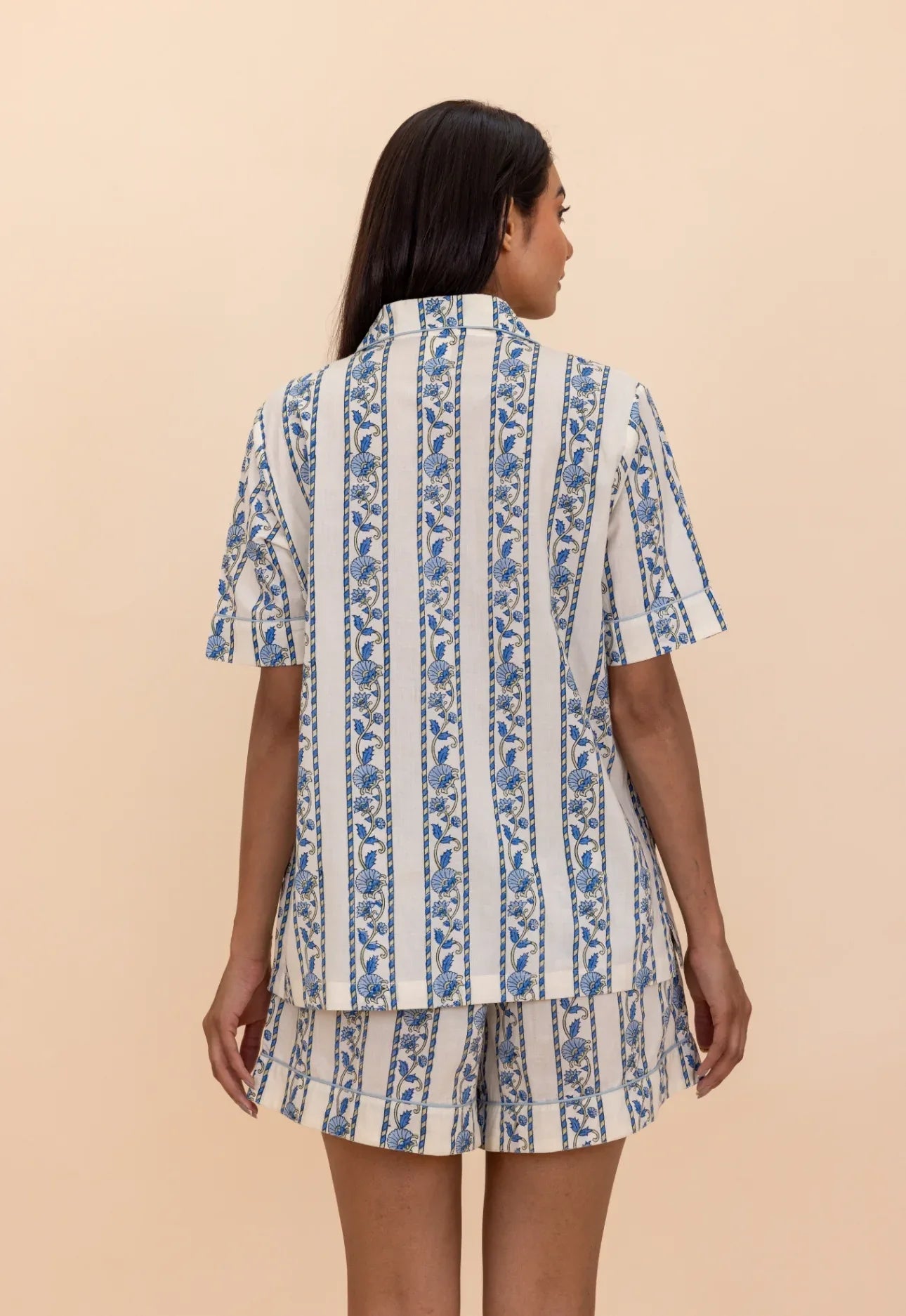 Back of model wearing Cobalt Ribbon Cotton Pyjamas
