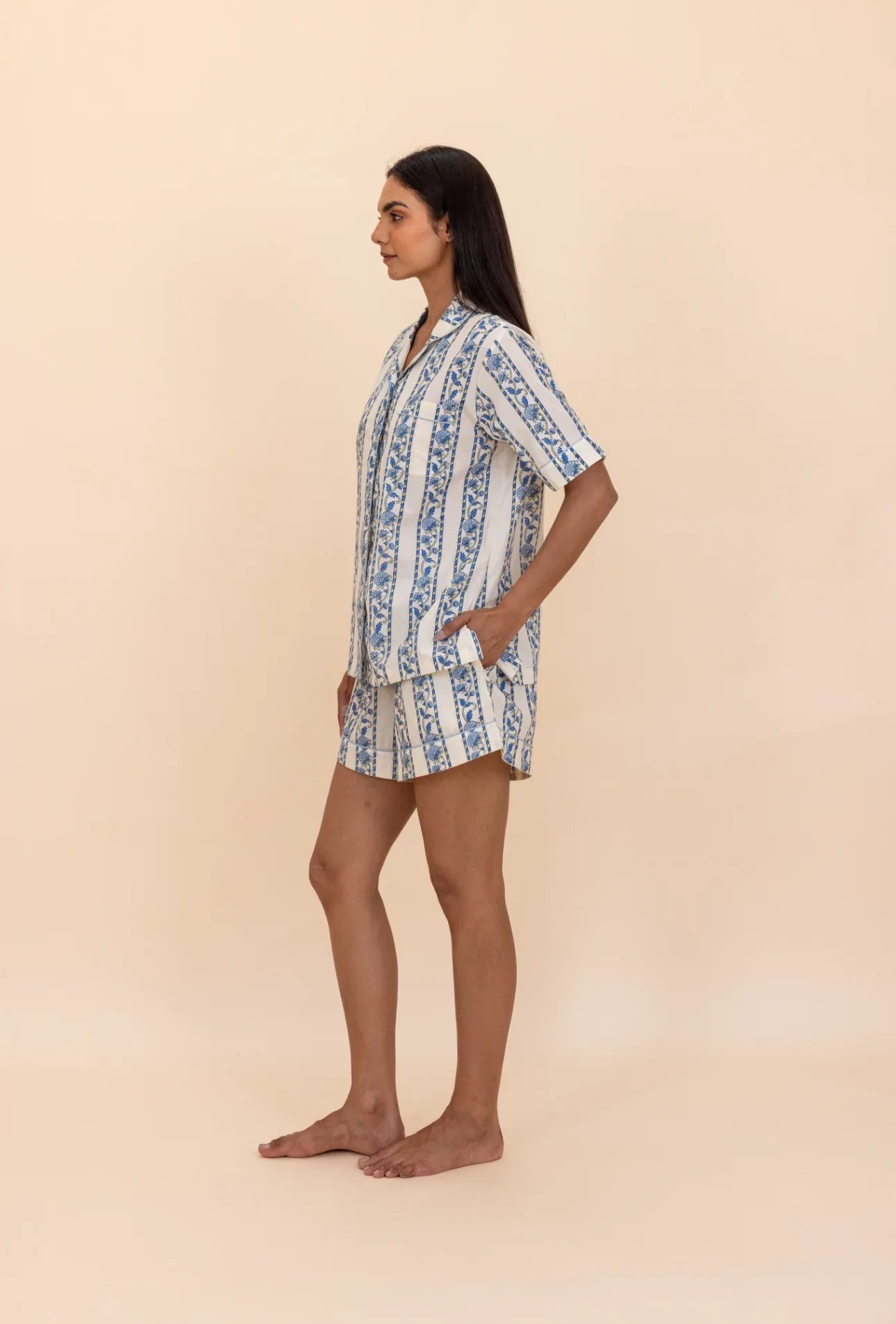 Side view of model wearing Cobalt Ribbon Cotton Pyjamas