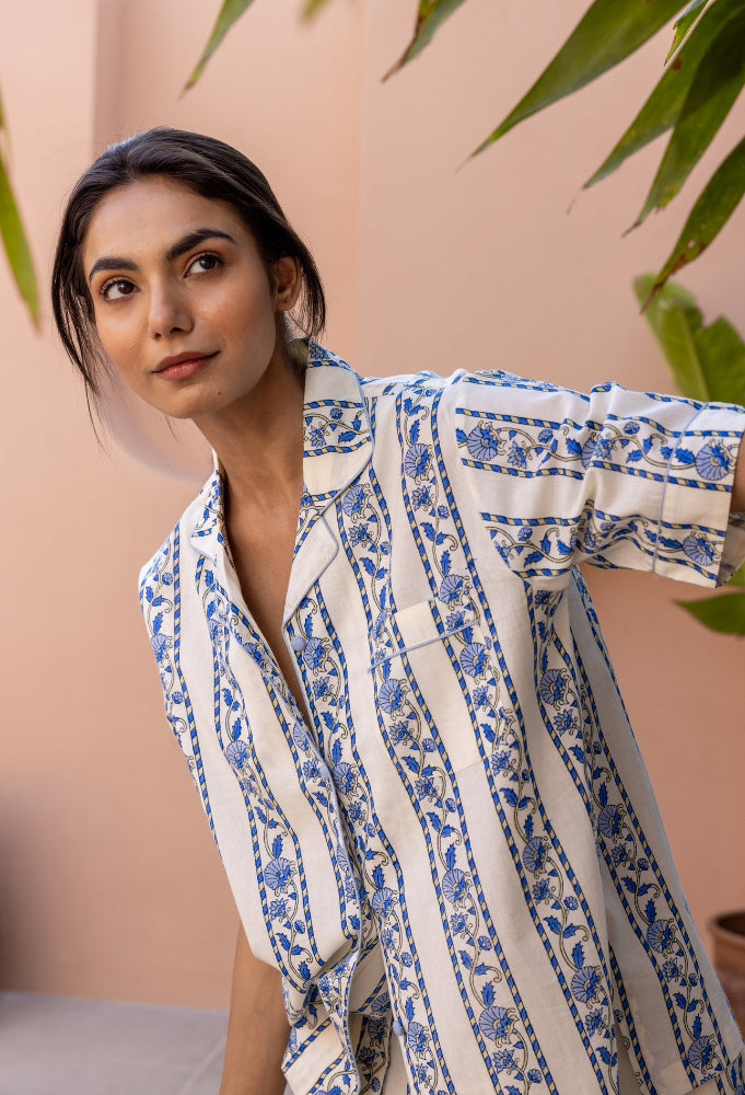 Model looking away wearing Cobalt Ribbon Cotton Pyjamas