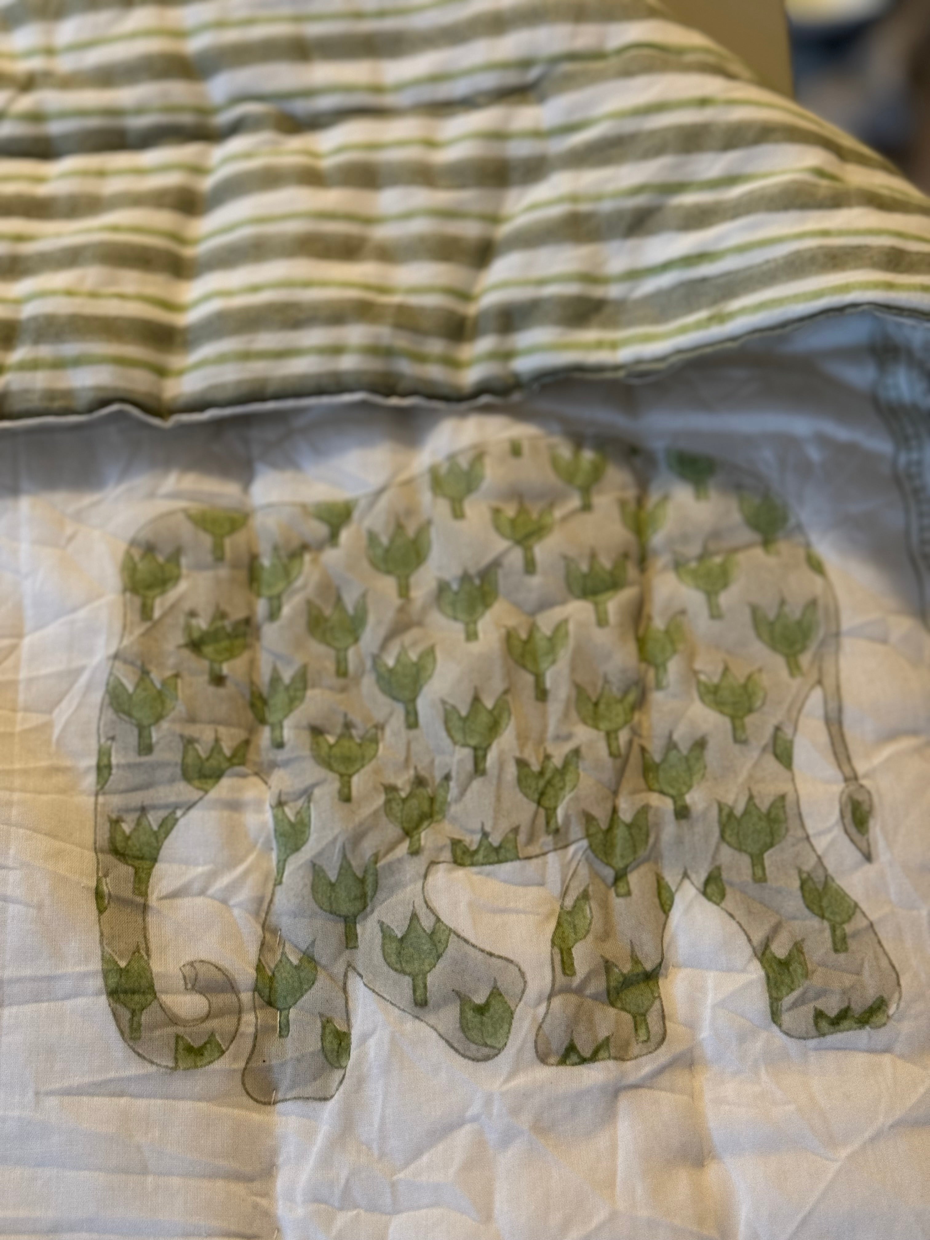 A close image of Enzo the elephant quilt