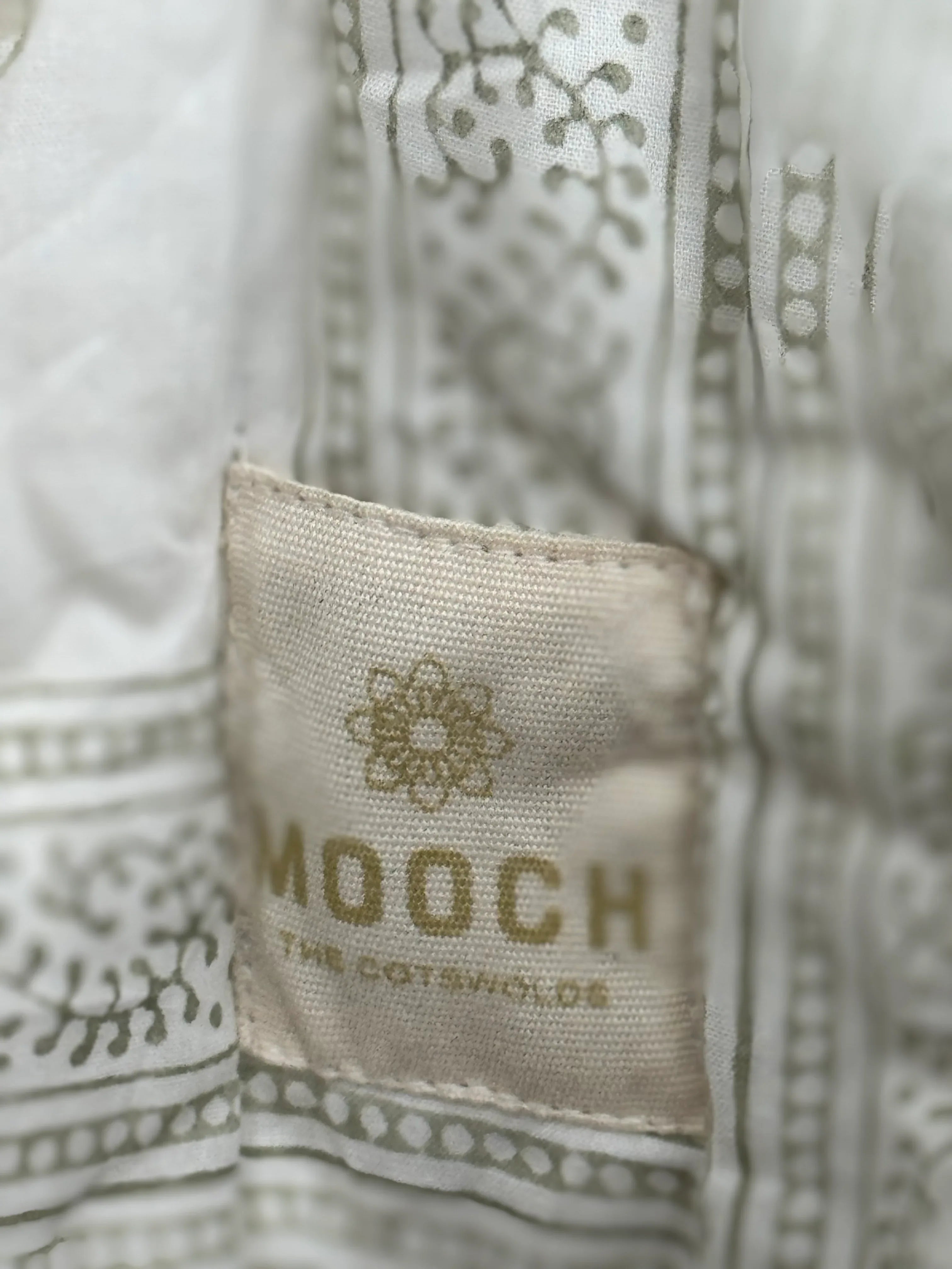 Enzo quilt and Mooch label zoom in