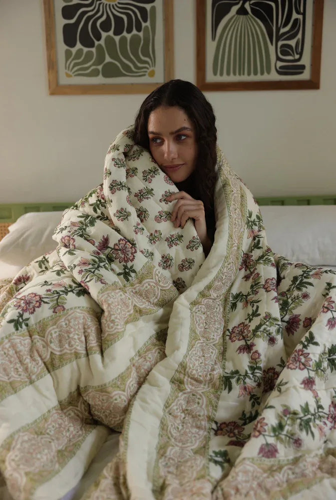 Model wrapped in Paxford willow quilt