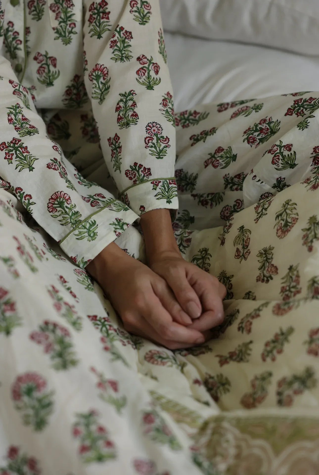 Models hands laid on the reverse side of Paxford Willow quilt