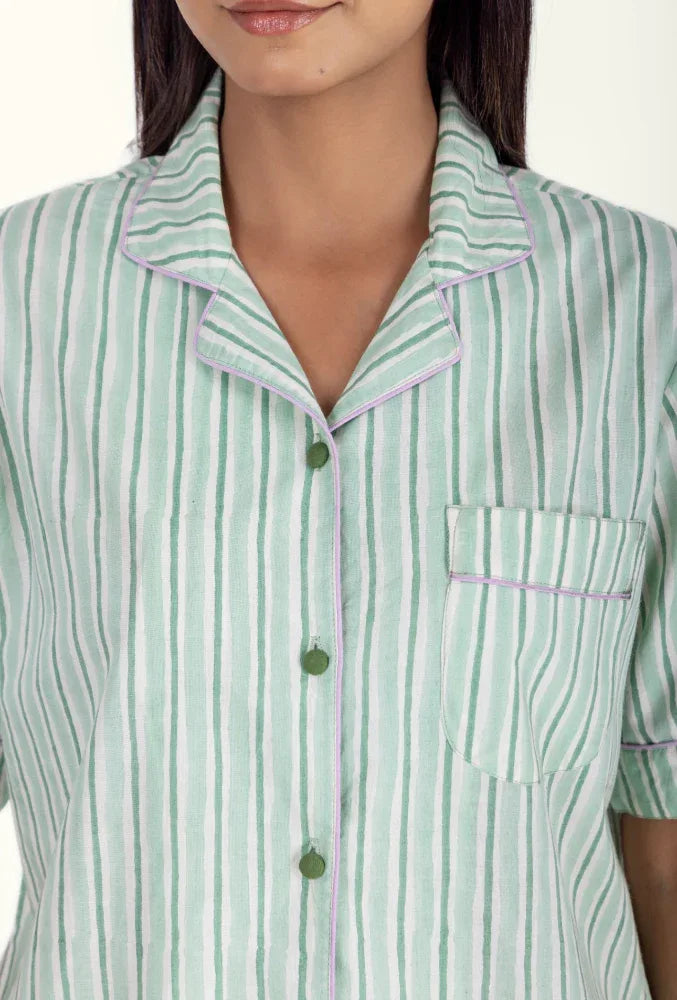 Close-up of model wearing Wilson Stripe Aqua Cotton Pyjama Top