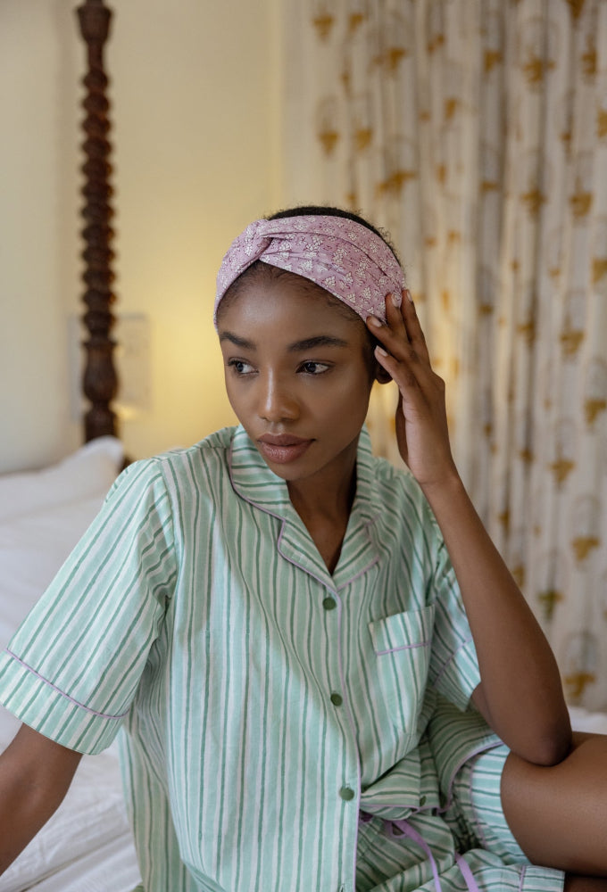 Model wearing headband and Wilson Stripe Aqua Cotton Pyjamas