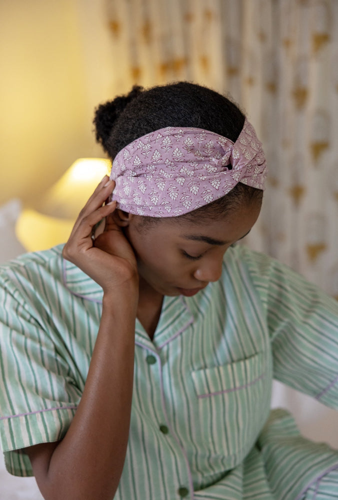 Model wearing headband and Wilson Stripe Aqua Cotton Pyjamas