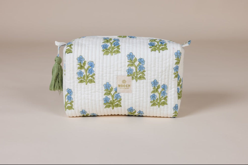 Blue and green floral quilted wash bag in shopify image