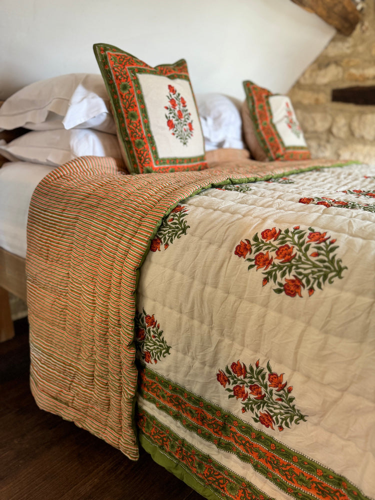 Wilson amber quilted bedspread on a bed in a bedroom setting.